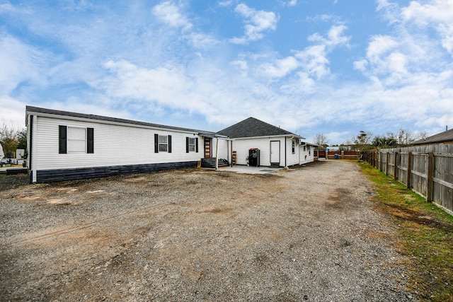 view of front of home featuring a patio