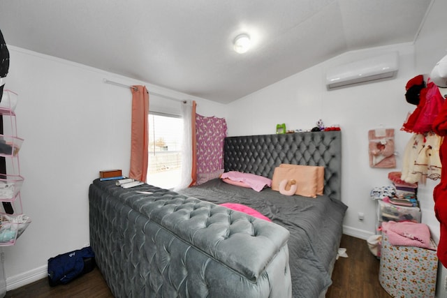 bedroom featuring lofted ceiling, a wall unit AC, and dark hardwood / wood-style floors