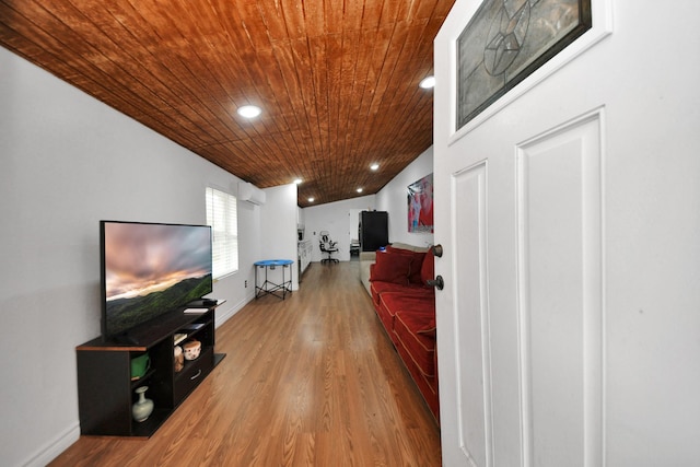 corridor featuring hardwood / wood-style flooring, lofted ceiling, and wood ceiling