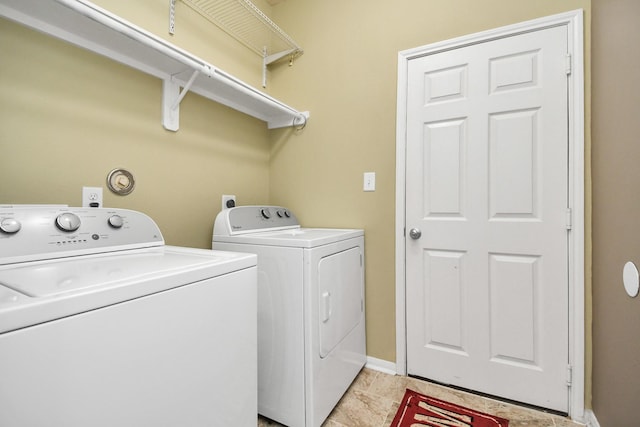 laundry area with washer and clothes dryer