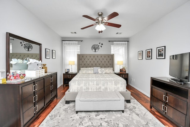 bedroom featuring hardwood / wood-style floors and ceiling fan