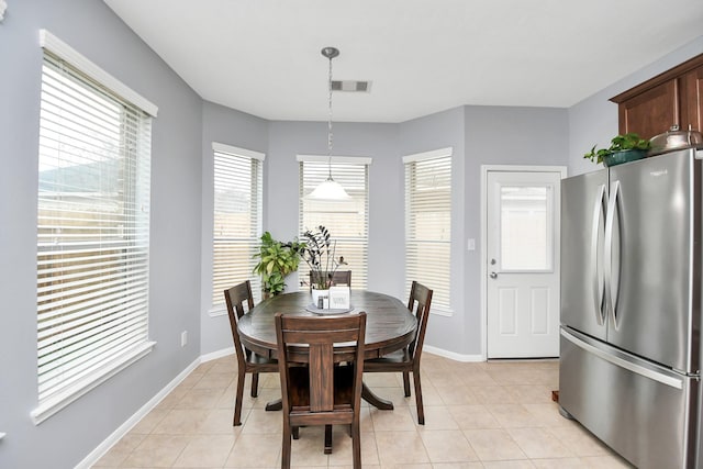 dining room featuring light tile patterned floors