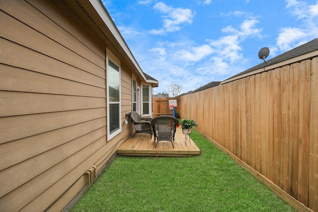 view of yard featuring a wooden deck