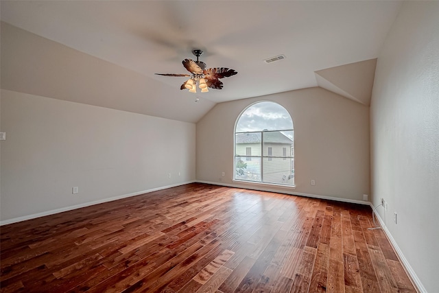bonus room featuring wood finished floors, a ceiling fan, lofted ceiling, and baseboards
