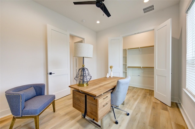 home office with light wood finished floors, recessed lighting, visible vents, ceiling fan, and baseboards