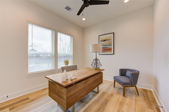 office space with ceiling fan, recessed lighting, visible vents, baseboards, and light wood finished floors