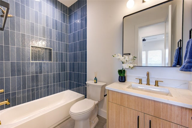 bathroom with bathing tub / shower combination, toilet, and vanity