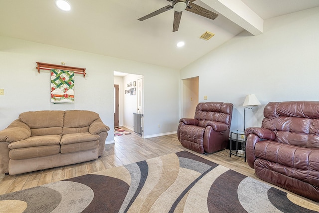 living area featuring lofted ceiling with beams, light wood-style flooring, recessed lighting, visible vents, and baseboards