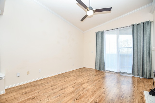 spare room with lofted ceiling, crown molding, ceiling fan, and light wood-type flooring