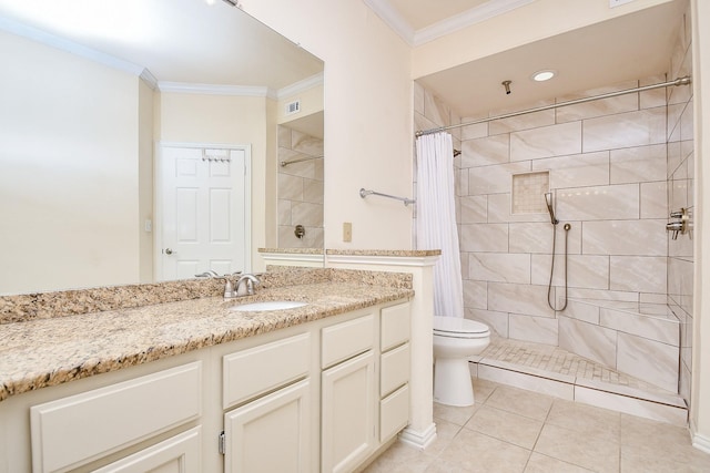 bathroom featuring tiled shower, toilet, vanity, and crown molding