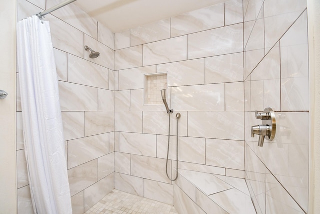 bathroom featuring curtained shower