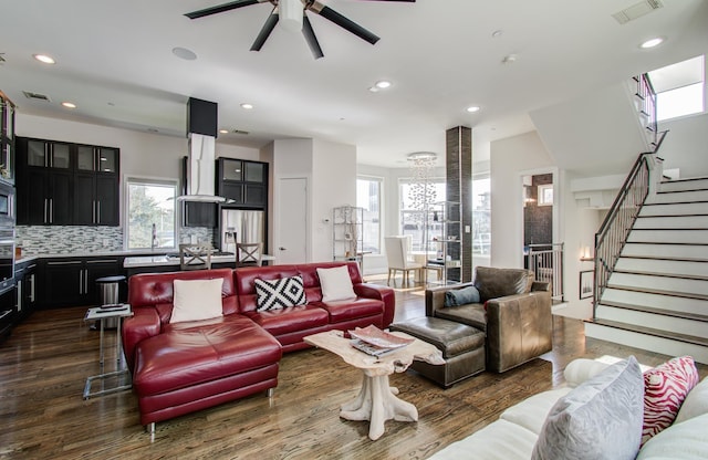 living room with visible vents, dark wood finished floors, a ceiling fan, stairs, and recessed lighting