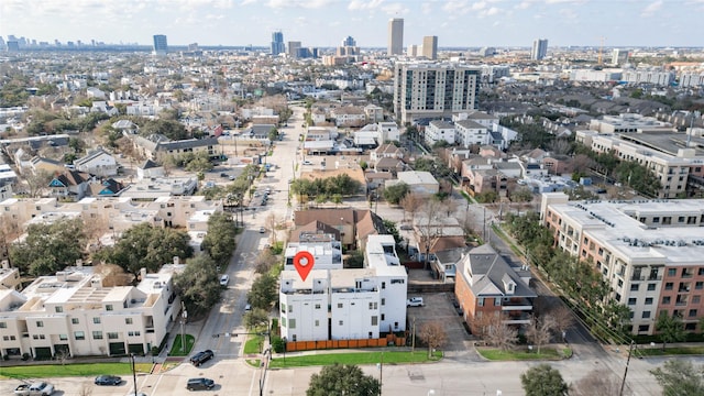 drone / aerial view featuring a city view