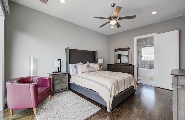 bedroom featuring dark wood-style floors, connected bathroom, a ceiling fan, and recessed lighting