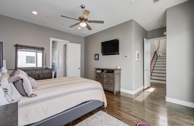 bedroom with recessed lighting, dark wood-style flooring, ceiling fan, and baseboards