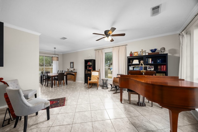 sitting room featuring ornamental molding, light tile patterned floors, and ceiling fan