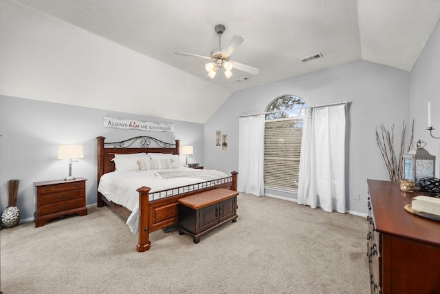 carpeted bedroom featuring lofted ceiling and ceiling fan