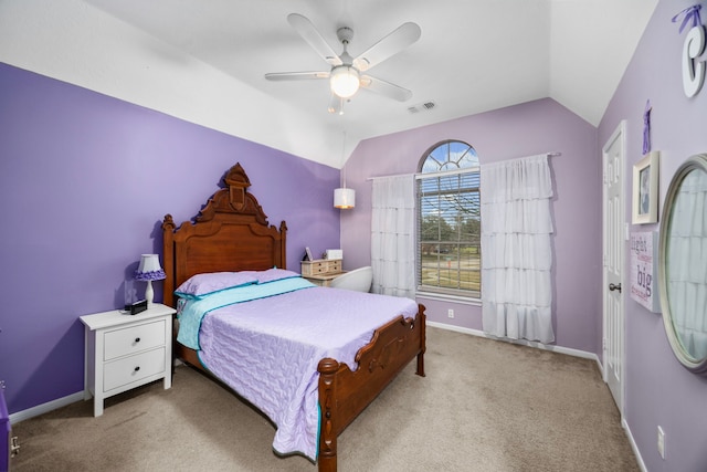 carpeted bedroom with lofted ceiling and ceiling fan