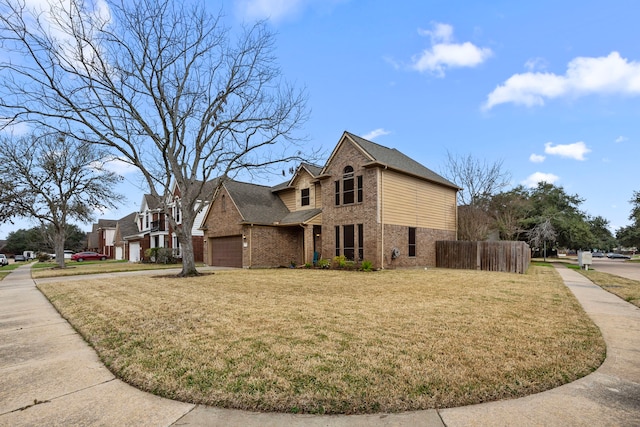 view of home's exterior featuring a garage and a yard