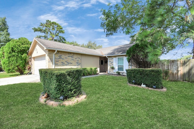 ranch-style house with a garage and a front lawn