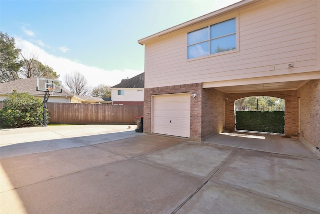 view of side of home with a garage