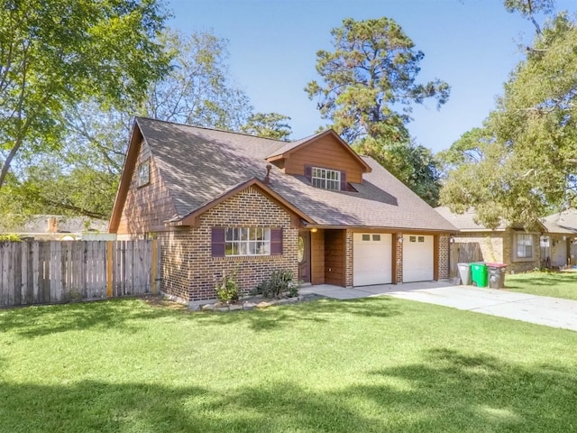 view of front of house with a garage and a front lawn