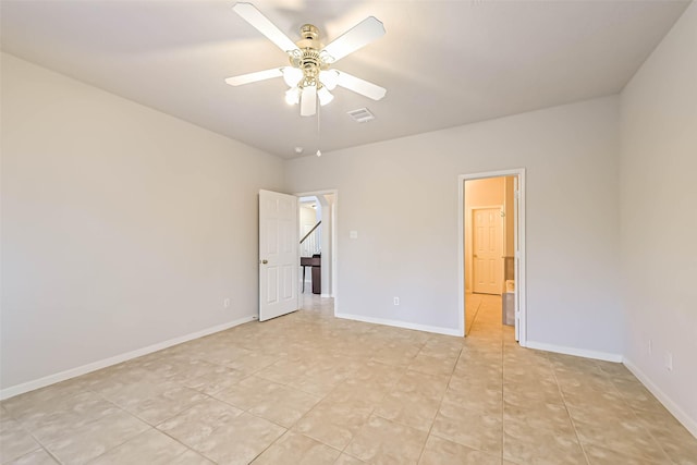 spare room featuring ceiling fan