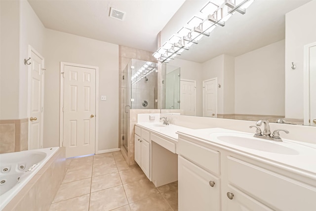 bathroom featuring tile patterned flooring, vanity, and plus walk in shower