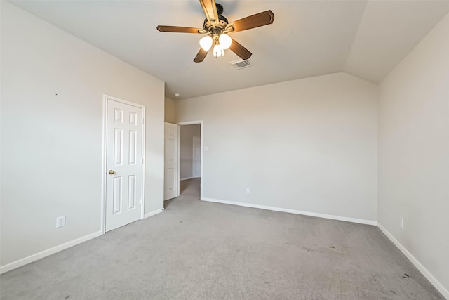 unfurnished bedroom with vaulted ceiling, carpet floors, and ceiling fan