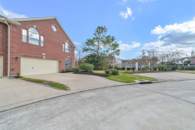 view of side of property with a garage