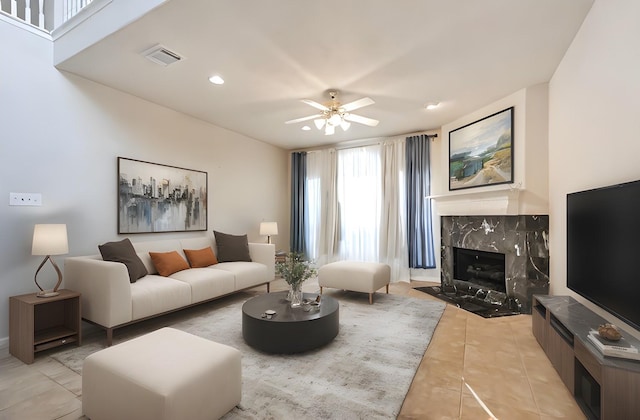 1408 S Friendswood Dr Unit 101, Friendswood, TX 77546 - living room with ceiling fan, a fireplace, light tile patterned floors, and recessed lighting