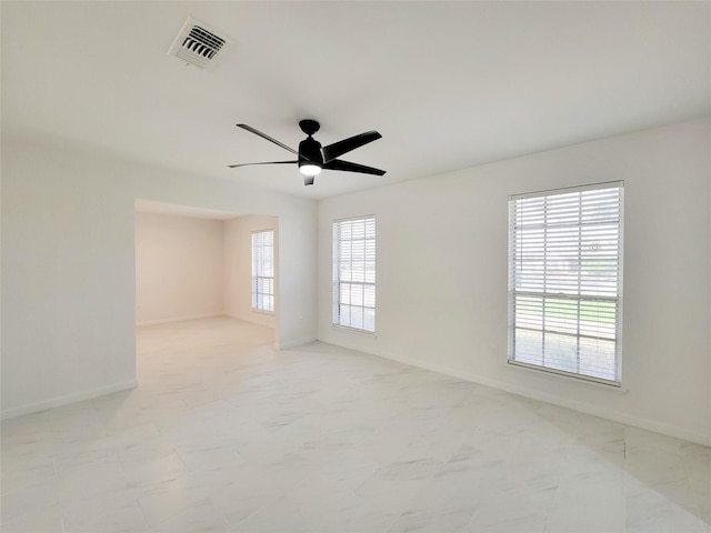 spare room featuring ceiling fan