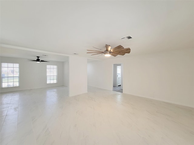 unfurnished room featuring ceiling fan