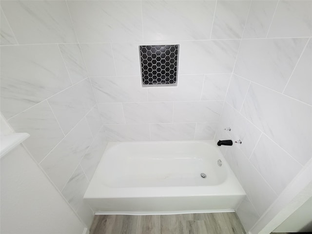 bathroom with wood-type flooring