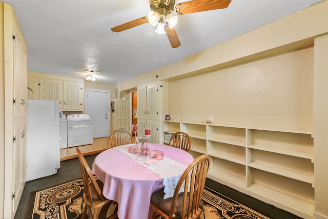 dining area with separate washer and dryer and ceiling fan