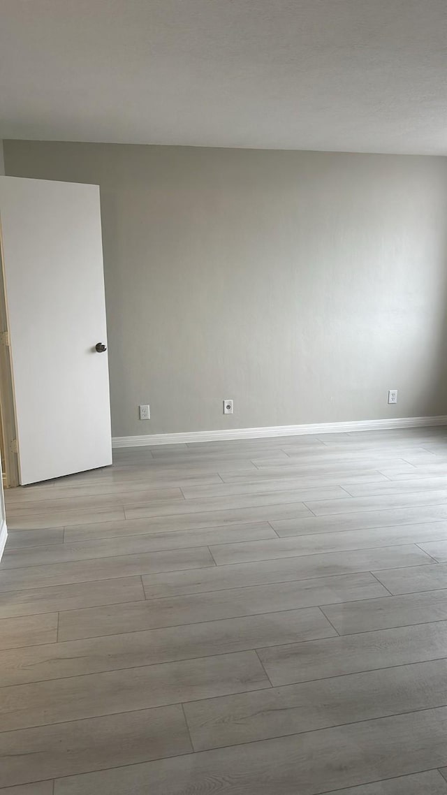 empty room featuring light hardwood / wood-style floors