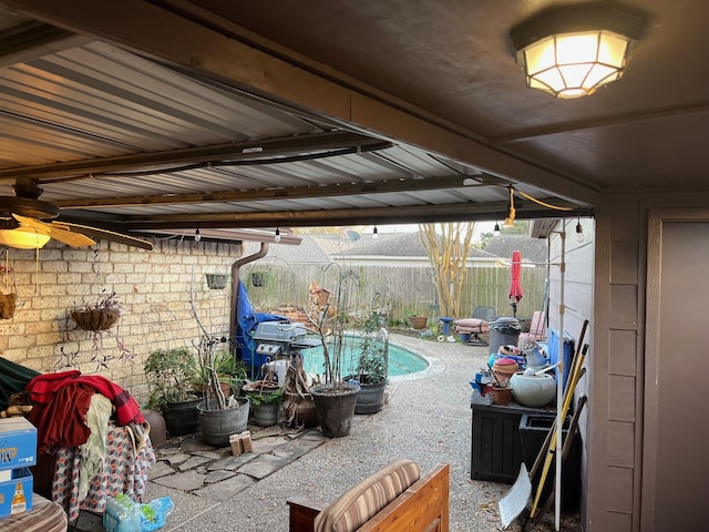 view of patio / terrace featuring a fenced in pool