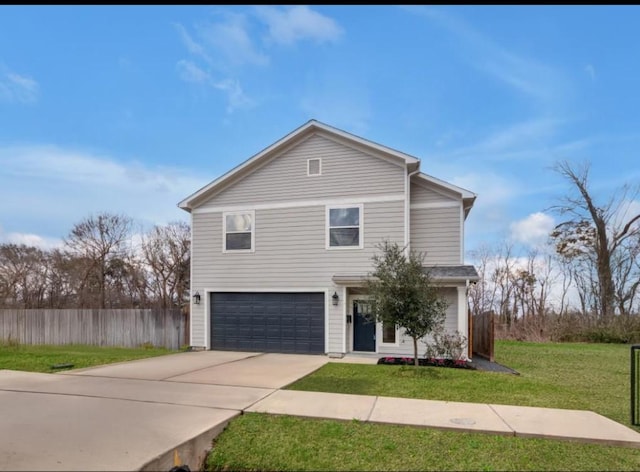 view of front property featuring a garage and a front yard