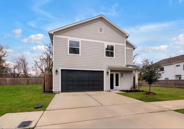 front of property featuring a garage and a front yard