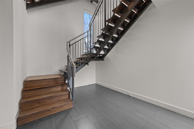 stairway featuring hardwood / wood-style floors