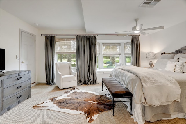 bedroom featuring light colored carpet