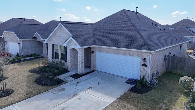 ranch-style home with a garage