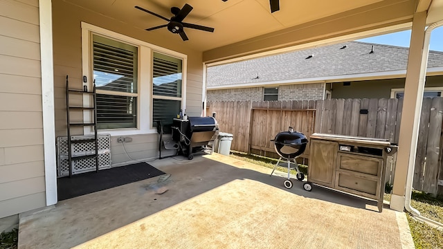 view of patio with grilling area and ceiling fan