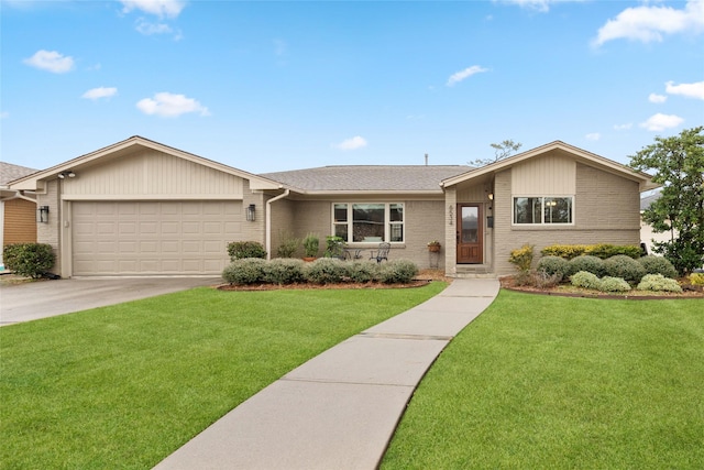 ranch-style house featuring a garage and a front yard