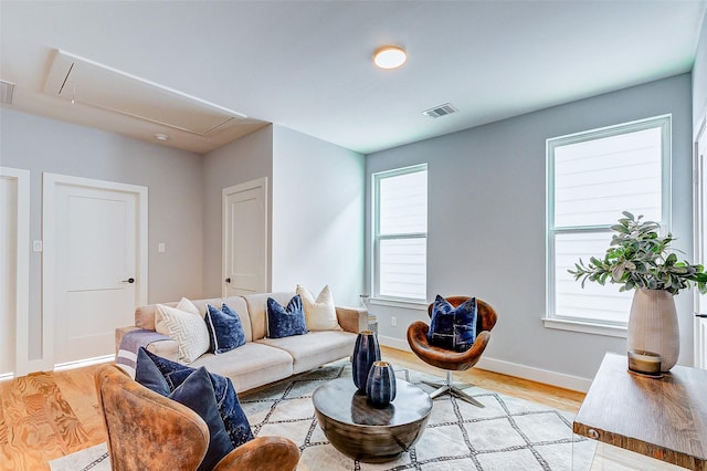 living room with light hardwood / wood-style floors