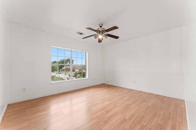 unfurnished room featuring ceiling fan and light hardwood / wood-style floors