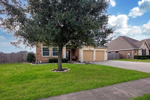 single story home with a garage and a front yard