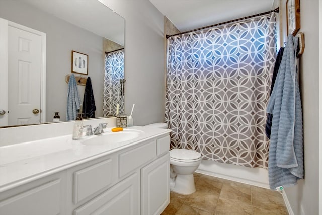 full bathroom featuring vanity, shower / tub combo, and toilet