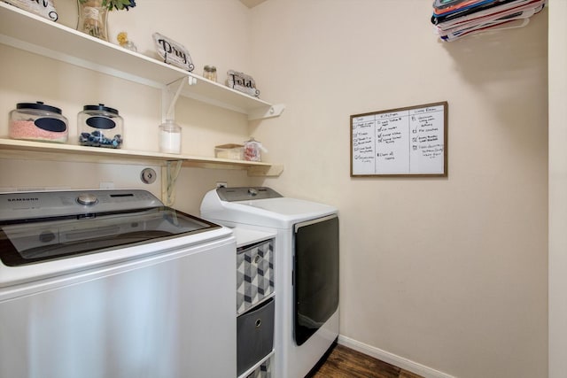 washroom featuring dark hardwood / wood-style floors and independent washer and dryer