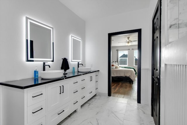 bathroom with vanity and ceiling fan